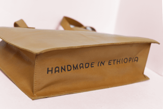 Large Leather Handbag with Laptop Divider - *This is not legal advice