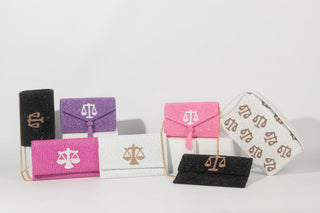 Set of purses with 'scales of justice' symbol on a white background